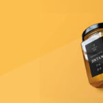 A mockup of a jar of tofu with the words 'Experience Jintan' and 'Tofu on it' Various words are written on it in Mandarin.